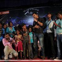Karthi Dancing with Aruwe Homeless Children Stills | Picture 381595