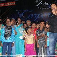 Karthi Dancing with Aruwe Homeless Children Stills | Picture 381596