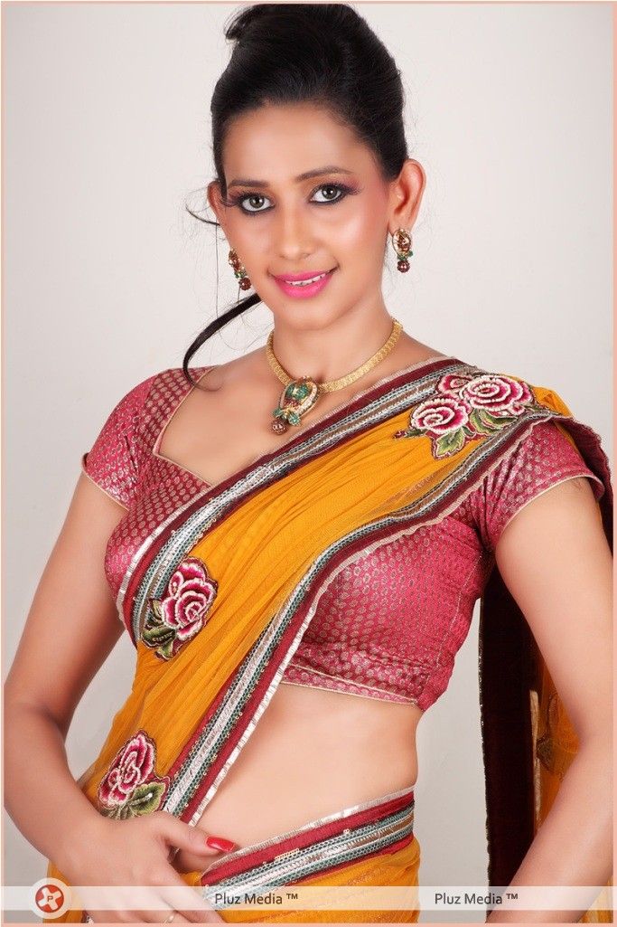 Sanjana Singh Hot in Yaarukku Theriyum - Stills | Picture 167665