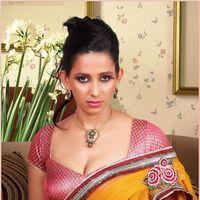 Sanjana Singh Hot in Yaarukku Theriyum - Stills | Picture 167631