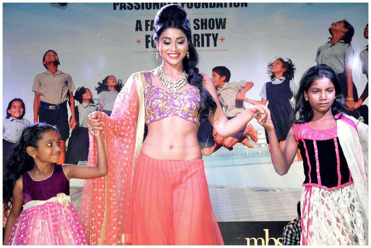 Shriya Saran Ramp Walk at Passionate Foundation Fashion Show Photos | Picture 477270