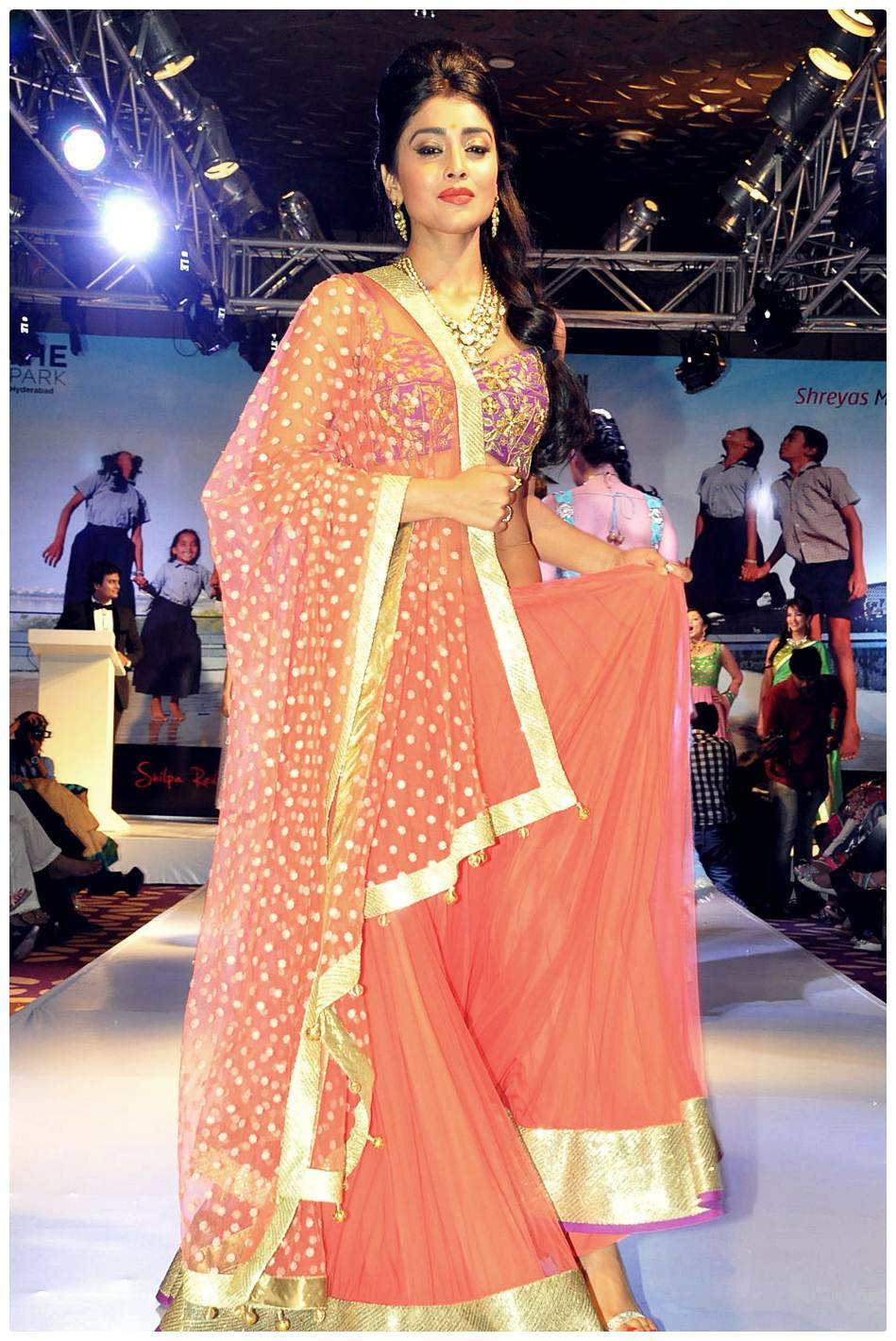 Shriya Saran Ramp Walk at Passionate Foundation Fashion Show Photos | Picture 477298