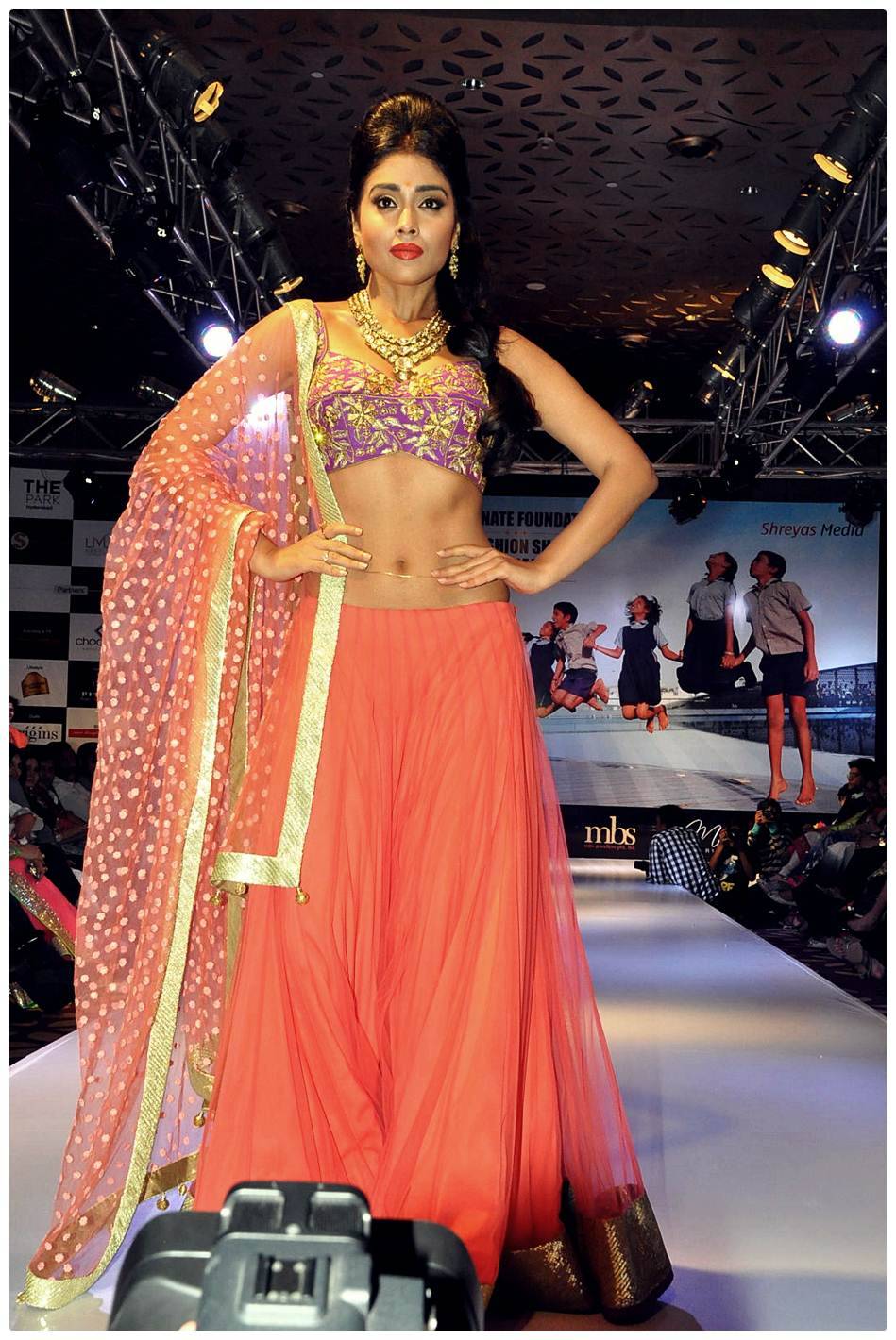 Shriya Saran Ramp Walk at Passionate Foundation Fashion Show Photos | Picture 477299